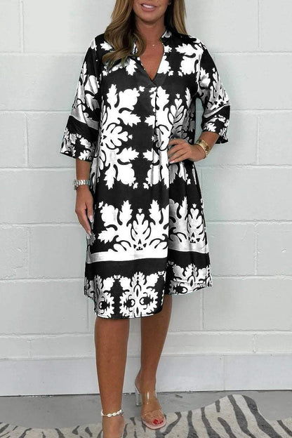 Robe Rayonnante En Col V