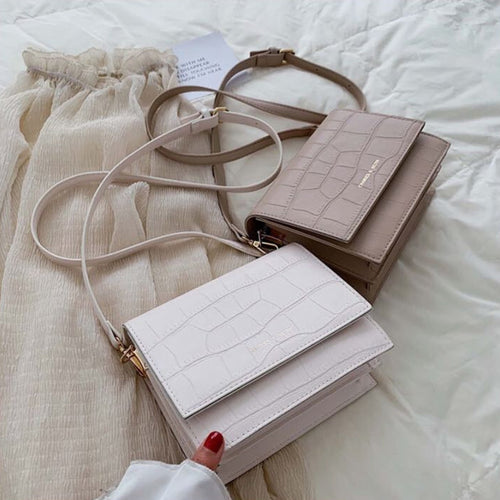 Sac à bandoulière en cuir texturé