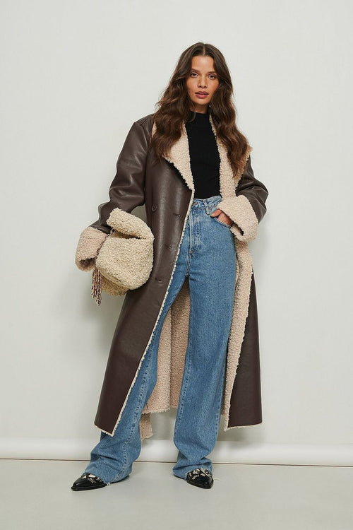 Manteau en faux cuir à détail en peluche