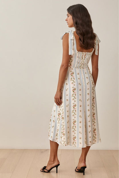 Pauline Laurent® | Robe midi imprimée avec bretelle à nœuds et fente