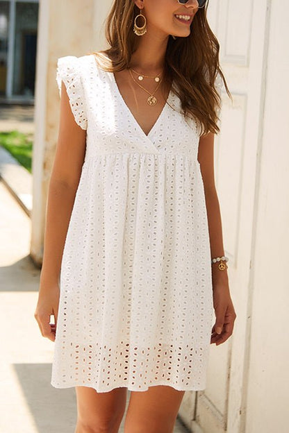 Robe d'été romantique avec broderie anglaise et manches à volants