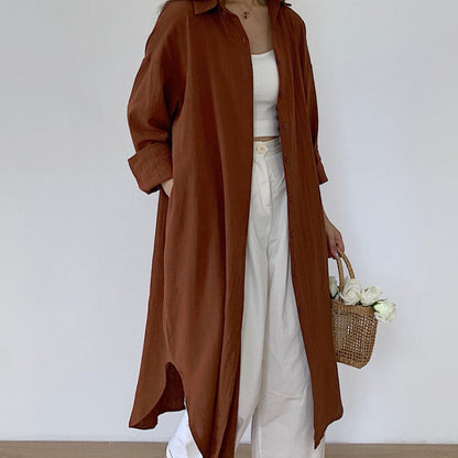 Robe boutonnée respirante de couleur unie avec revers