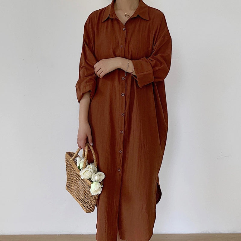 Robe boutonnée respirante de couleur unie avec revers