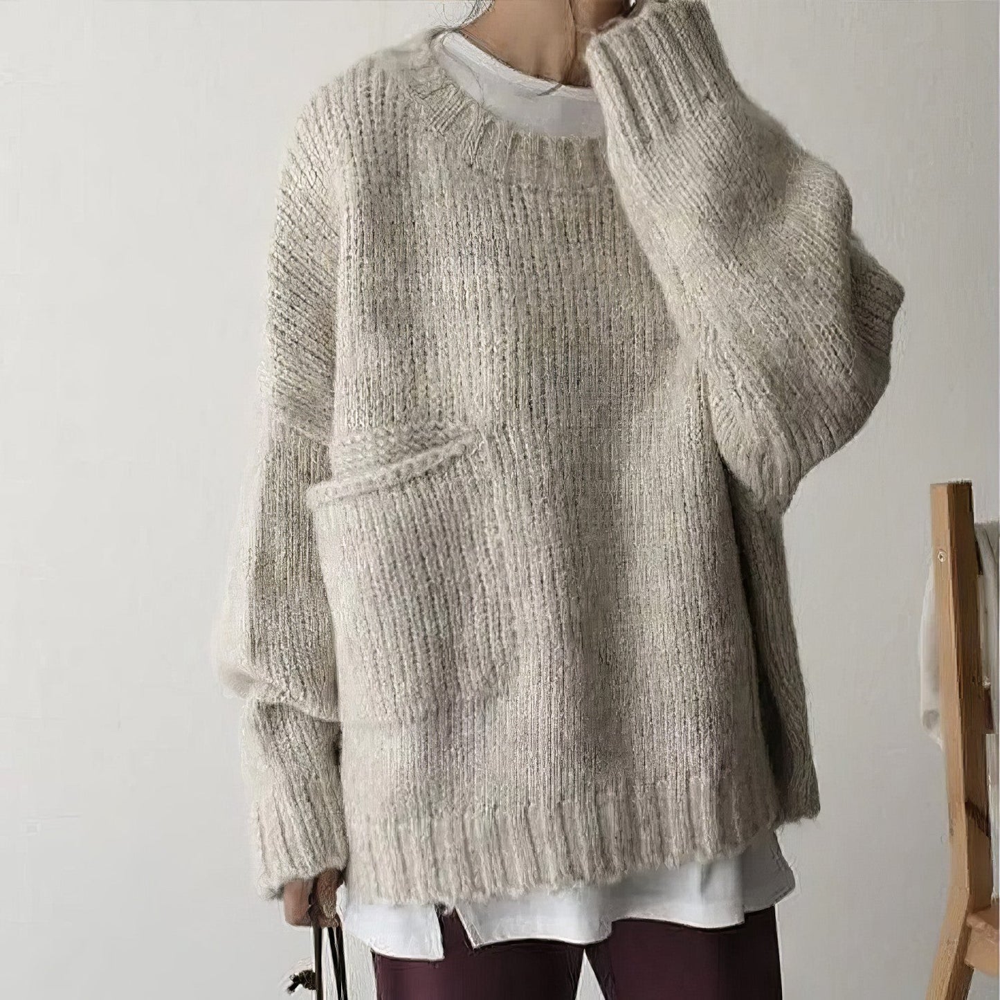 Pull oversized ivoire avec poches frontales