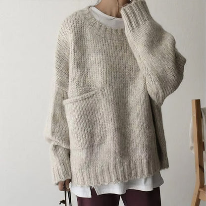 Pull oversized ivoire avec poches frontales