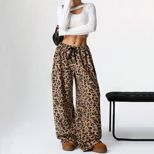 Pantalon femme à imprimé léopard et jambes larges