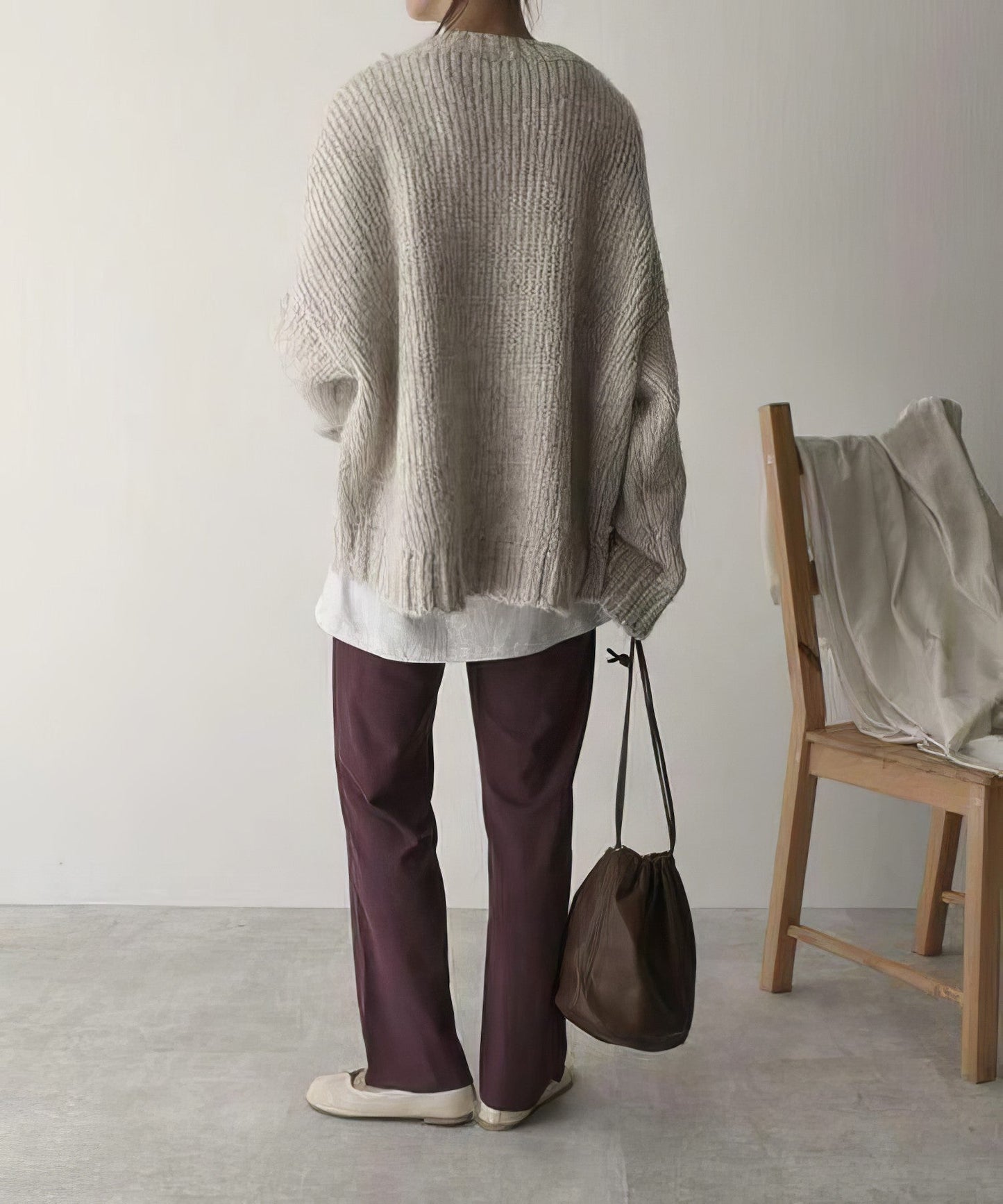Pull oversized ivoire avec poches frontales