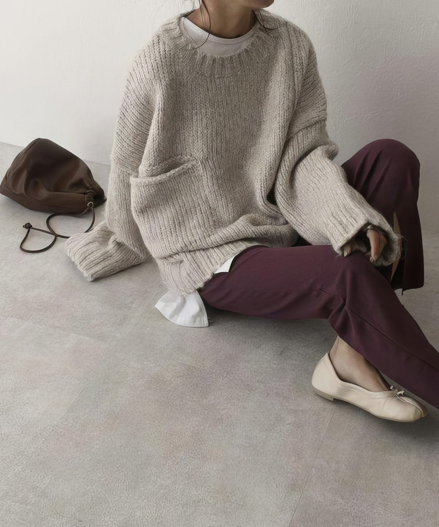 Pull oversized ivoire avec poches frontales