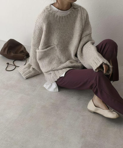 Pull oversized ivoire avec poches frontales