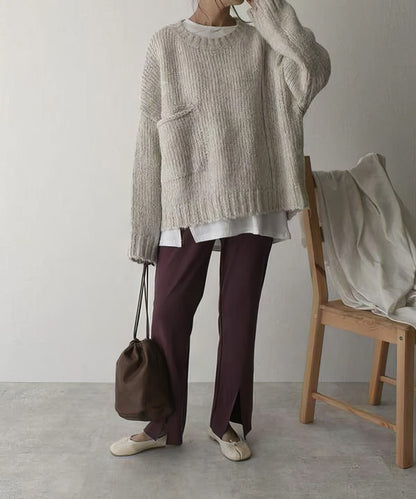 Pull oversized ivoire avec poches frontales